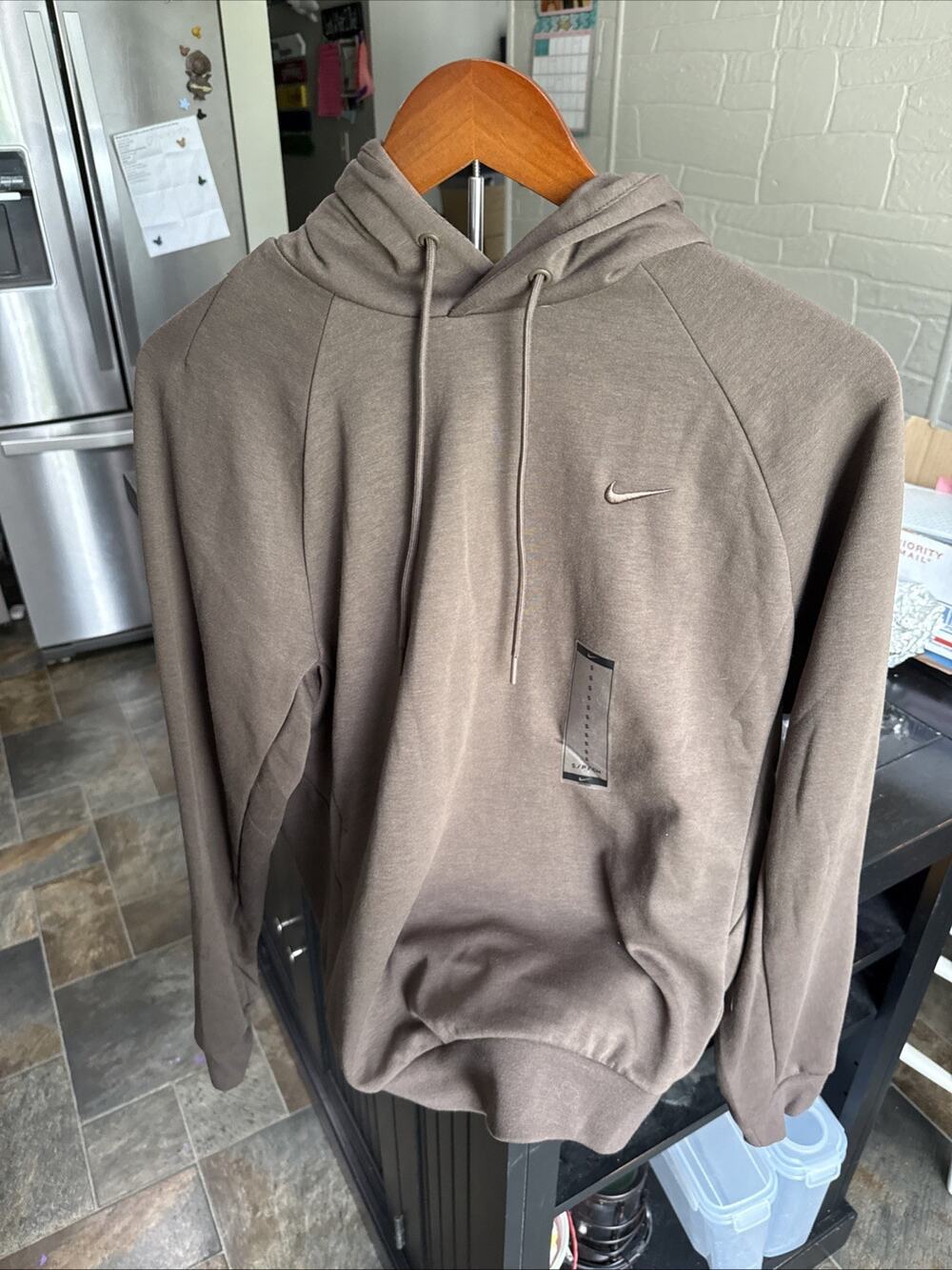 small brown nike hoodie